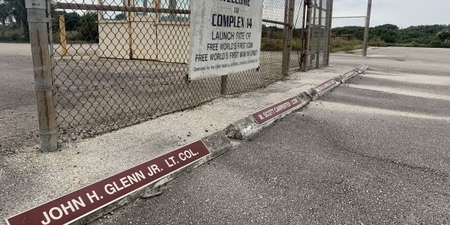 Some historic launch pads in Cape Canaveral appear frozen in time. Astronaut John Glenn, the first American to orbit the Earth, still has a labeled parking space at the entrance to Launch Compex 14.