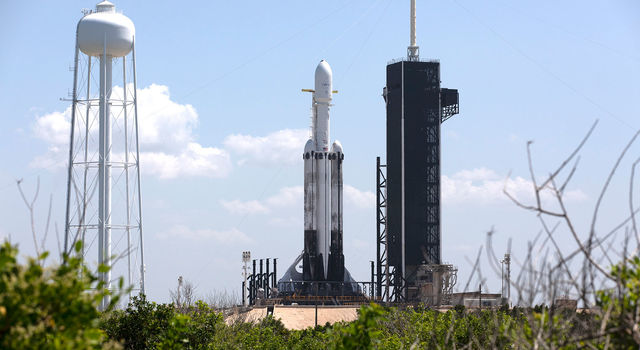 A SpaceX Falcon Heavy rocket is ready for launch on the pad at Launch Complex 39A at NASA's Kennedy Space Center in Florida