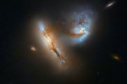 NASA news Hubble Space Telescope pictures colliding galaxies UGC 2369