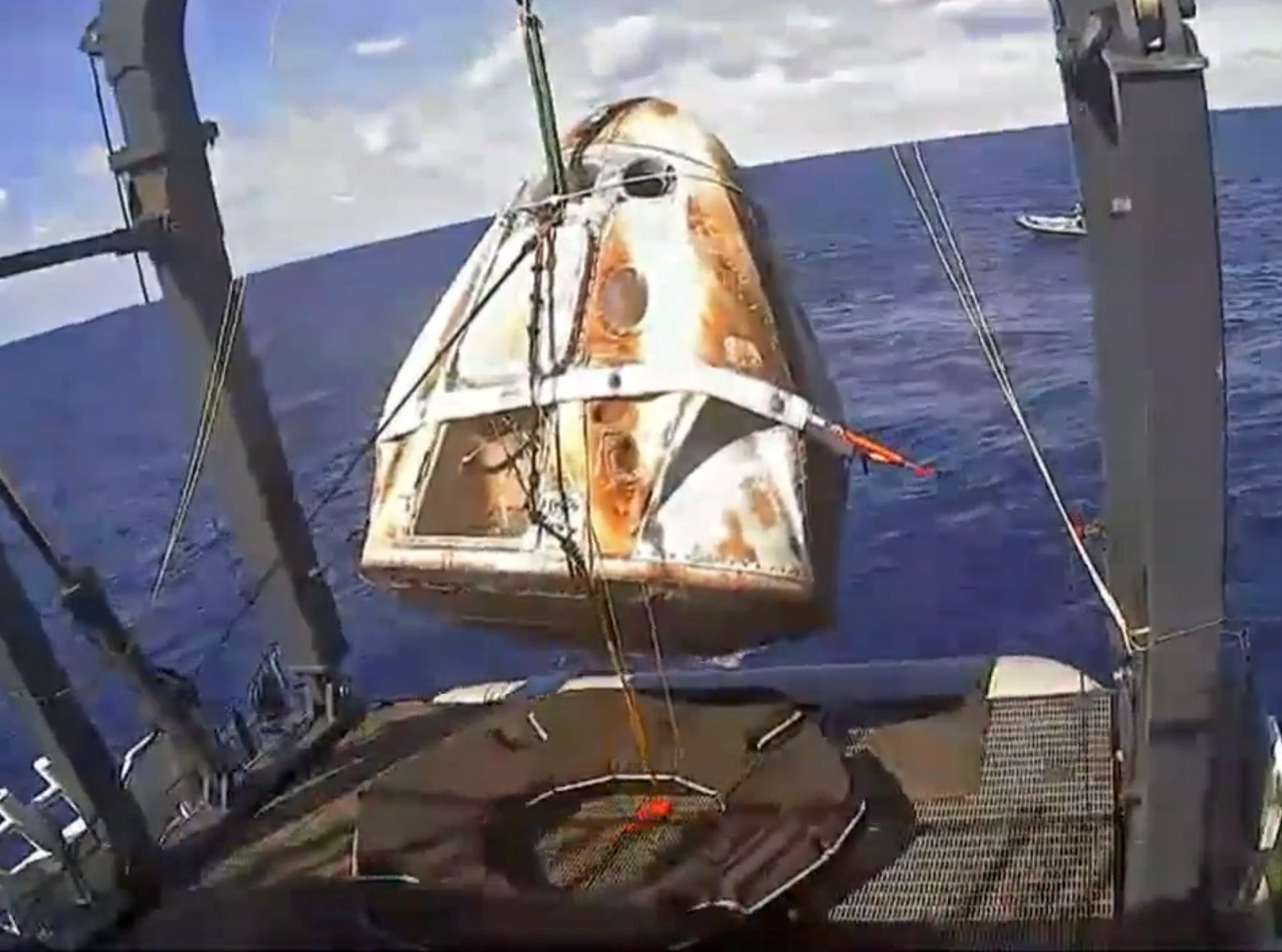 The SpaceX’s Dragon capsule is retrieved by a recovery ship after its splashdown in the Atlantic Ocean, March 8, 2019. The Crew Dragon Demo-1 docked autonomously to the orbiting laboratory, a historic first for a commercially built and operated US crewed spacecraft. 