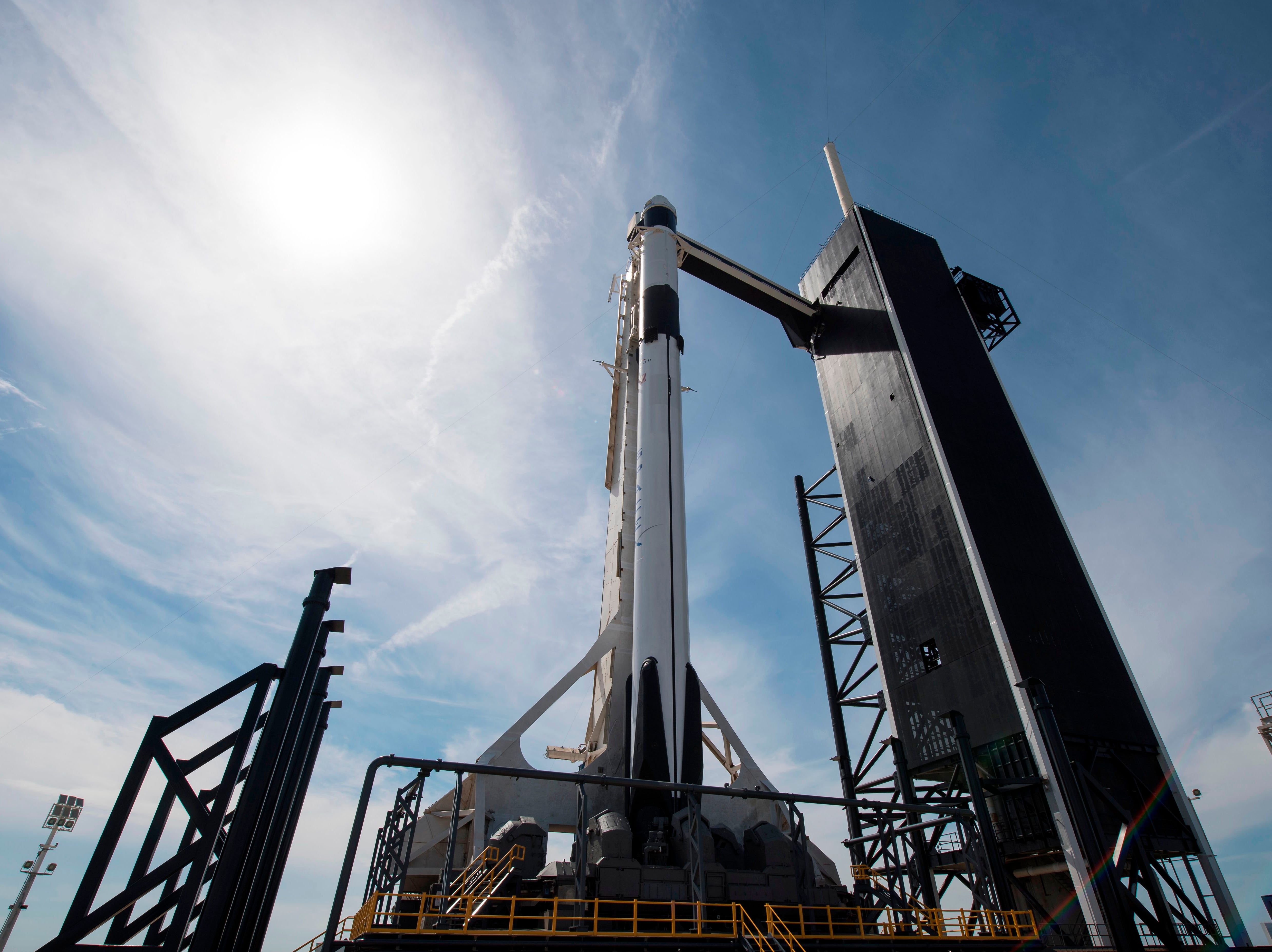 A SpaceX Falcon 9 rocket with the company's Crew Dragon spacecraft onboard on the launch pad at Launch Complex 39A at the Kennedy Space Center in Fla. March 1, 2019. 