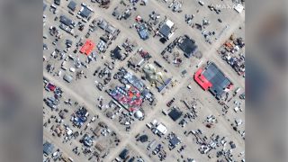 Some of the traffic building up in anticipation of this year's Burning Man, as seen in satellite images released by Maxar Technologies. 