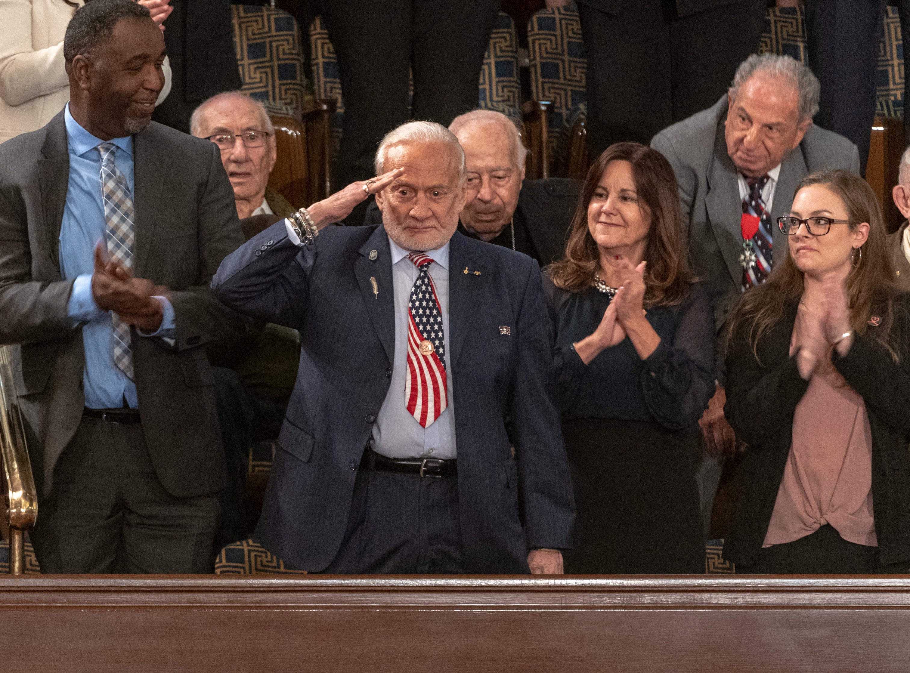 Former Aastronaut Buzz Aldrin salutes after being introduced at the 2019 State of the Union address in Washington D.C. Feb 5, 2019. 