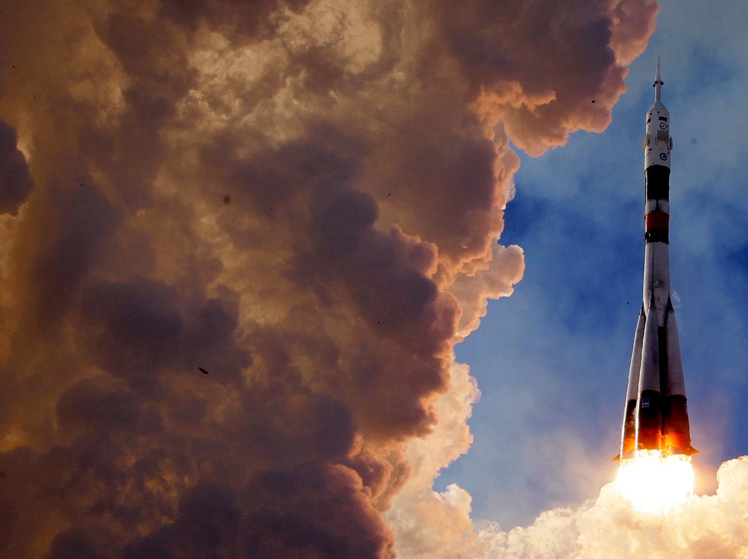 The Russian Soyuz booster rocket FG with Soyuz MS-07 spacecraft lifts off from the launch pad at Baikonur Cosmodrome in Kazakhstan, Dec. 17, 2017. 