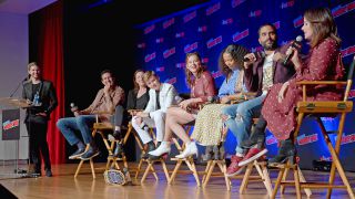 The cast of "Lost in Space" speaks at a panel at New York Comic-Con on Oct. 5, 2019. 