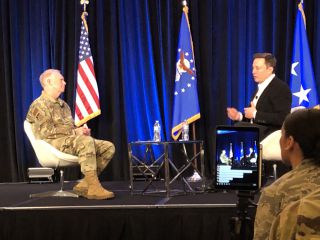 SpaceX founder and CEO Elon Musk chats with Lt. Gen. John Thompson, commander of the Space and Missile Systems Center, Air Force Space Command, at Los Angeles Air Force Base. The conversation took place in San Francisco on Nov. 5, 2019, at the U.S. Air Force's first Space Pitch Day.