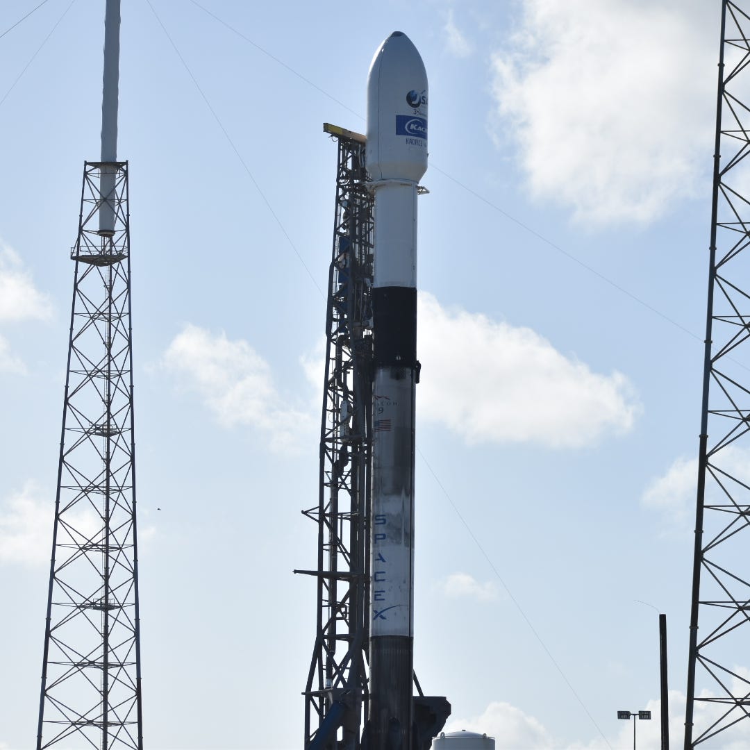 SpaceX's Falcon 9 rocket stands upright on Dec. 16, 2019 at Cape Canaveral Air Force Station Launch Complex 40 ahead of the JCSAT-18 / KACIFIC-1 mission.