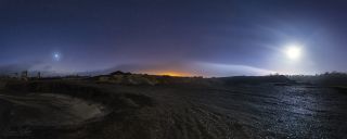 Venus, Jupiter and a partially eclipsed moon light up the sky over Mina de São Domingos at the Dark Sky Alqueva Reserve in Mértola, Portugal.