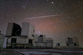 A satellite flare lights up the sky over the European Southern Observatory's Very Large Telescope (VLT) array on Paranal mountain in Chile in this sparkling image by ESO photo ambassador Roger Wesson. The four main unit telescopes that make up VLT are pictured here. Not pictured are the array's four smaller auxiliary telescopes.