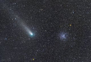 Comet 21P/Giacobini-Zinner passes by the open star cluster M37 on Sept. 10, 2018, in this deep-space image by astrophotographer Miguel Claro.