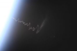 David Saint-Jacques snapped this photo from the International Space Station April 4 of the launch trail left by the Progress 72 cargo spacecraft.