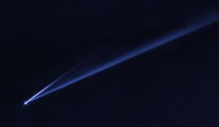 This Hubble Space Telescope image reveals the gradual self-destruction of the asteroid (6478) Gault, whose ejected dusty material has formed two long, thin, comet-like tails. The longer tail stretches more than 500,000 miles (800,000 kilometers) and is roughly 3,000 miles (4,800 km) wide. The shorter tail is about a quarter as long. The streamers will eventually disperse into space.