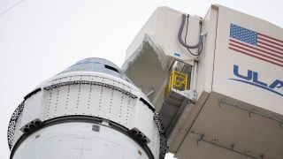 The crew access arm is seen after being moved into position for Boeing’s CST-100 Starliner spacecraft atop a United Launch Alliance Atlas V rocket on the launch pad at Space Launch Complex 41 ahead of the Orbital Flight Test mission, Wednesday, Dec. 18, 2019 at Cape Canaveral Air Force Station in Florida. 