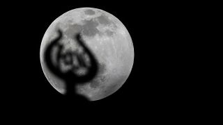 The moon is seen during partial lunar eclipse over Istanbul, Turkey on Jan. 10, 2020.