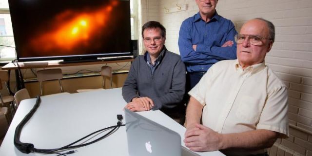 Iowa State astronomers -- left to right, Charles Kerton, Curtis Struck and Allen Lawrence -- have revealed a rare double-nucleus structure in a nearby and well-known galaxy.