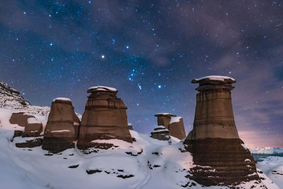 Orion rising behind the iconic Hoodoos on Highway 10 east of Drumheller