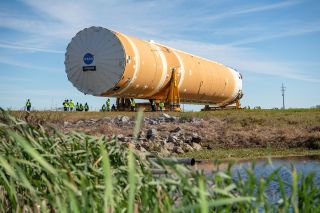 NASA’s 1st SLS Megarocket Core Loaded Onto Barge Ahead of Key Engine Test – Space.com